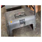 Plastic Step Stool Containing Plumbing Tools and Fittings
