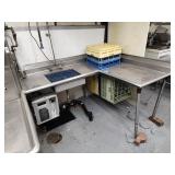 Dishwasher with 2 drain holes and dish racks