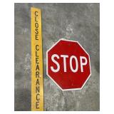 Street Stop Sign & Clearance Road Sign.