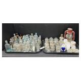 2 Trays Of Various Glass Bottles.