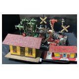 Train Crossing Signs & Tin Buildings.