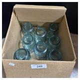 Box Of Blue Glass Mason Jars.