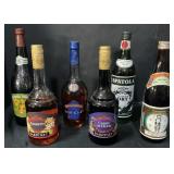 Sealed Sake, Brandy, Vermouth Bottles.