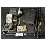 Various Vintage Cameras, Drum Sticks & Cell Phone.