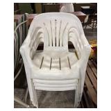 4 Plastic White Chairs.