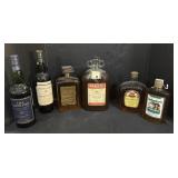 6  Liquor Bottles.