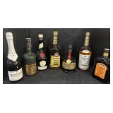 7 Liquor Bottles.