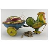 Vintage Tin Litho Easter Rooster Pulling Egg Cart.