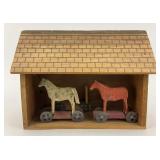 Early German Stick Leg Horses in Stable.