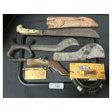 Cable Lock, Machete & Dagger, Replica Gun.