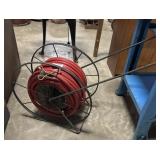 Wrought Iron Hose Reel & Hose.