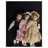3 Porcelain Dolls.