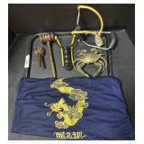 Sling Shots, Crab Ashtray, Vietnam T-Shirt.