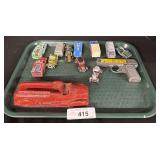 Various Toy Cars, Toy Pistol.