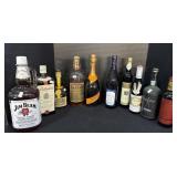 7 Wine Bottles, 4 Whiskey Bottles.