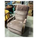 Upholstered Reclining Rocker.