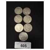 7 90% Silver Peace Dollars.