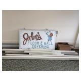 Johnï¿½s Floor Covering Sign and Spouting*.