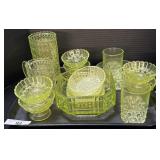 Tray Of Various Vaseline Glass, Pitcher, Dishes.