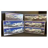 6 Collectible Hess Trucks.