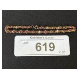 18K Gold Purple Gemstone Bracelet.