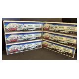 6 Collectible Hess Trucks.