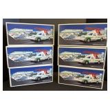 6 Collectible Hess Trucks.