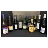 9 Wine Bottles, 1 Whiskey Bottle.