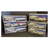 6 Collectible Hess Trucks.