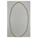 Beautiful String of Pearls Necklace w/ 14KT Clasp.