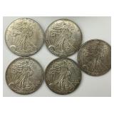 5 1 Troy Oz. Fine Silver Walking Liberty Dollars.