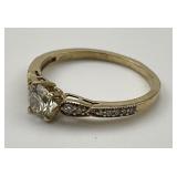 10KT Gold Round Cut Diamond Ring.