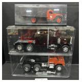 3 Plastic, Die Cast Model Semi Trucks. 3 Plastic, Die Cast Model Semi Trucks.