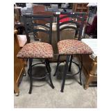 (2) Upholstered Swiveling Hightop Bar Stools. (2) Upholstered Swiveling Hightop Bar Stools.