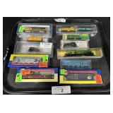 9 N Scale Train Cars & 3 N Scale Train Engines. 9 N Scale Train Cars & 3 N Scale Train Engines.
