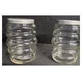 2 Glass Lidded Jars.