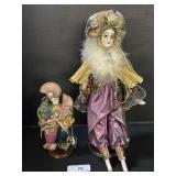 Pair Of Clown Porcelain Dolls.