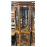 Lighted Corner Curio Cabinet.