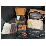 4 Tool Sets & Polaroid Camera.