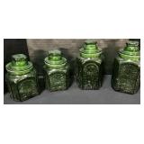 Set Of Four Pressed Glass Canister.