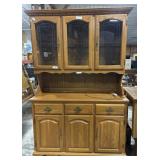 Lighted Wooden Hutch.