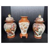 3 Floral Urns.