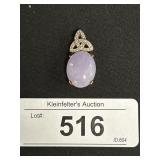 14Kt Gold Purple Gemstone Pendant.