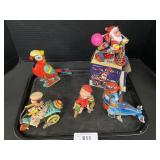 5 Tin Wind Up Toys.