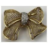 14KT Gold & Diamond Accent Bow Pendant.