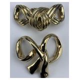 Pair of 14KT Gold Ribbon & Knot Pendants.