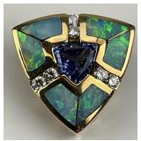 14KT Gold Opal, Sapphire, and Diamond Pendant.
