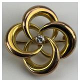 14KT Gold Love Knot w/ Diamond Center Pin.