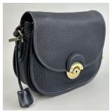 Dooney & Bourke All Weather Leather Purse.