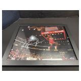 Framed Memorabilia Of Michael Jordan.